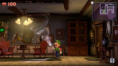 Luigi zielt mit dem Staubsauger gegen die Decke